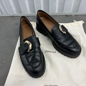 Flattered Black Leather Loafers with Gold Accent